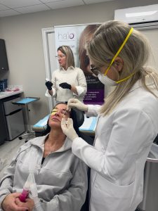 Dr. Beth Collins performs a croton oil peel on a patient at Results Medical Spa.